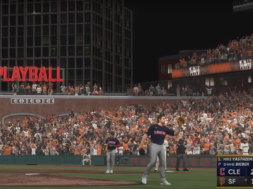 In MLB The Show 23, Shane Bieber of the Cleveland Guardians waits to get the ball back from the catcher in front of a packed crowd in San Francisco.
